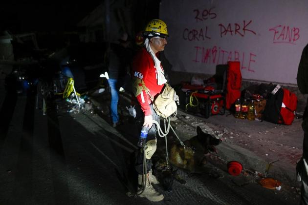Rescuers battle to unearth Venezuelan man eight days after quakes