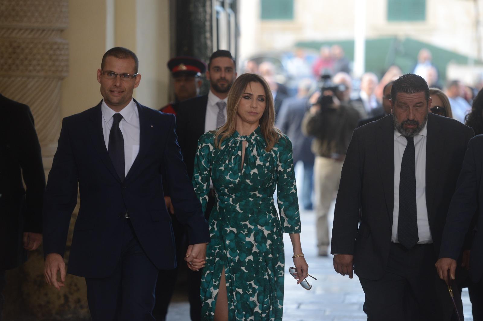 Prime Minister Robert Abela and wife Lydia arrive at the swearing-in ceremony (swipe for more photos). Photo: Jonathan Borg