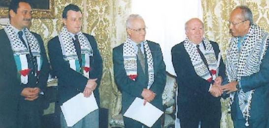 Maltese political leaders wearing a keffiyeh at a 2002 meeting with the Palestinian community. File photo: Alfred Giglio