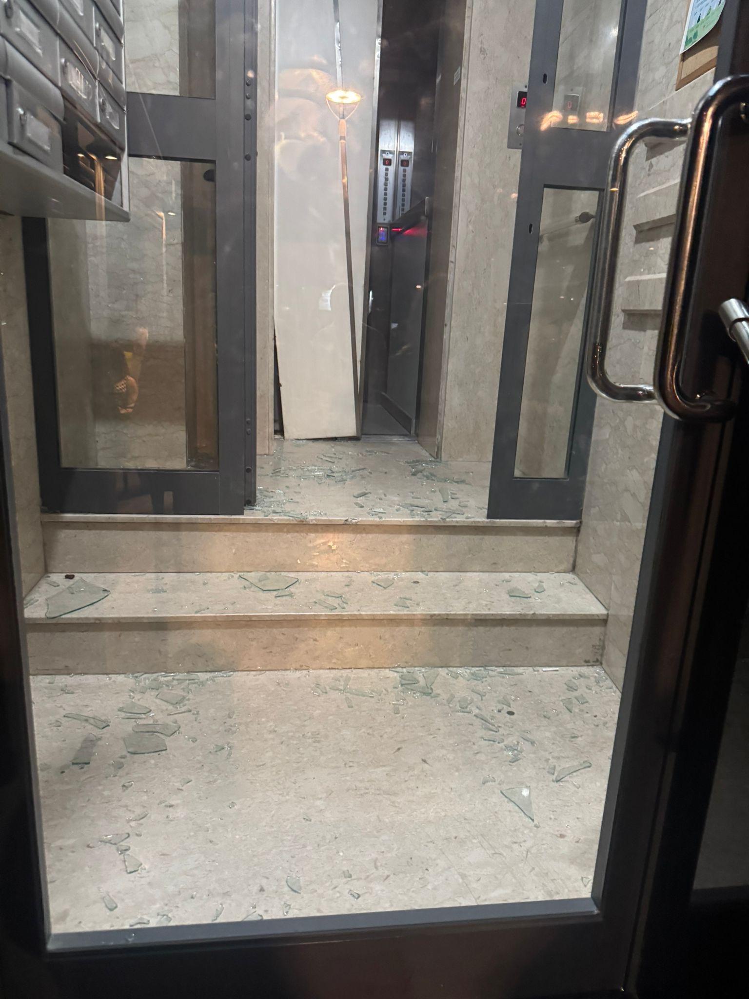 The shattered front door and broken lift. Photo: Jason Azzopardi