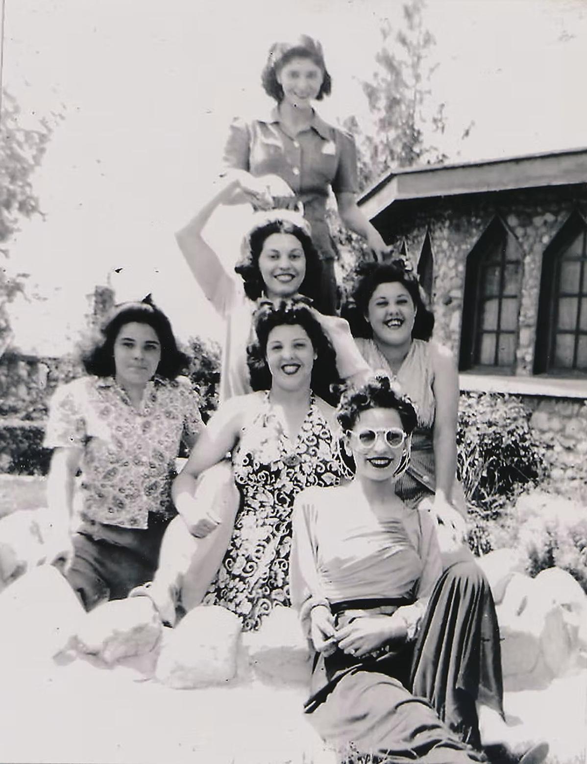 A day at the &lsquo;Stone Castle&rsquo; in 1941. Front: Rose Borg, second row: Carmen Camilleri, Anna Camilleri, third row: Mary Ann Sapiano and Mary Camilleri, back: Eileen Saliba. Photo donated by Joseph Brincat to the Maltese American Benevolent Society, Inc.