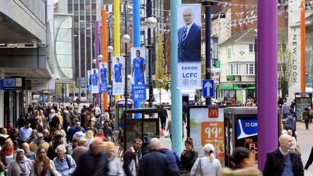 Giant banners featuring the Leciester City manager Claudio Ranieri and his squad, pictured in Leicester city centre.