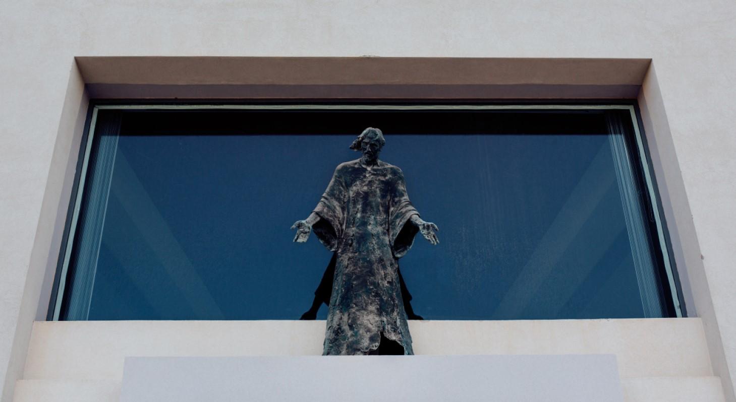 The statue of the welcoming Christ stands above the main door of the Divine Mercy Sanctuary in Naxxar.