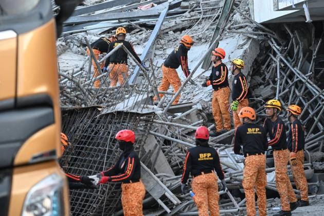 Rescuers search for 20 missing after Philippine building collapse