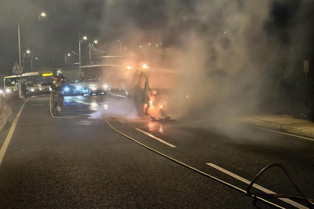 The minibus ablaze. CPD