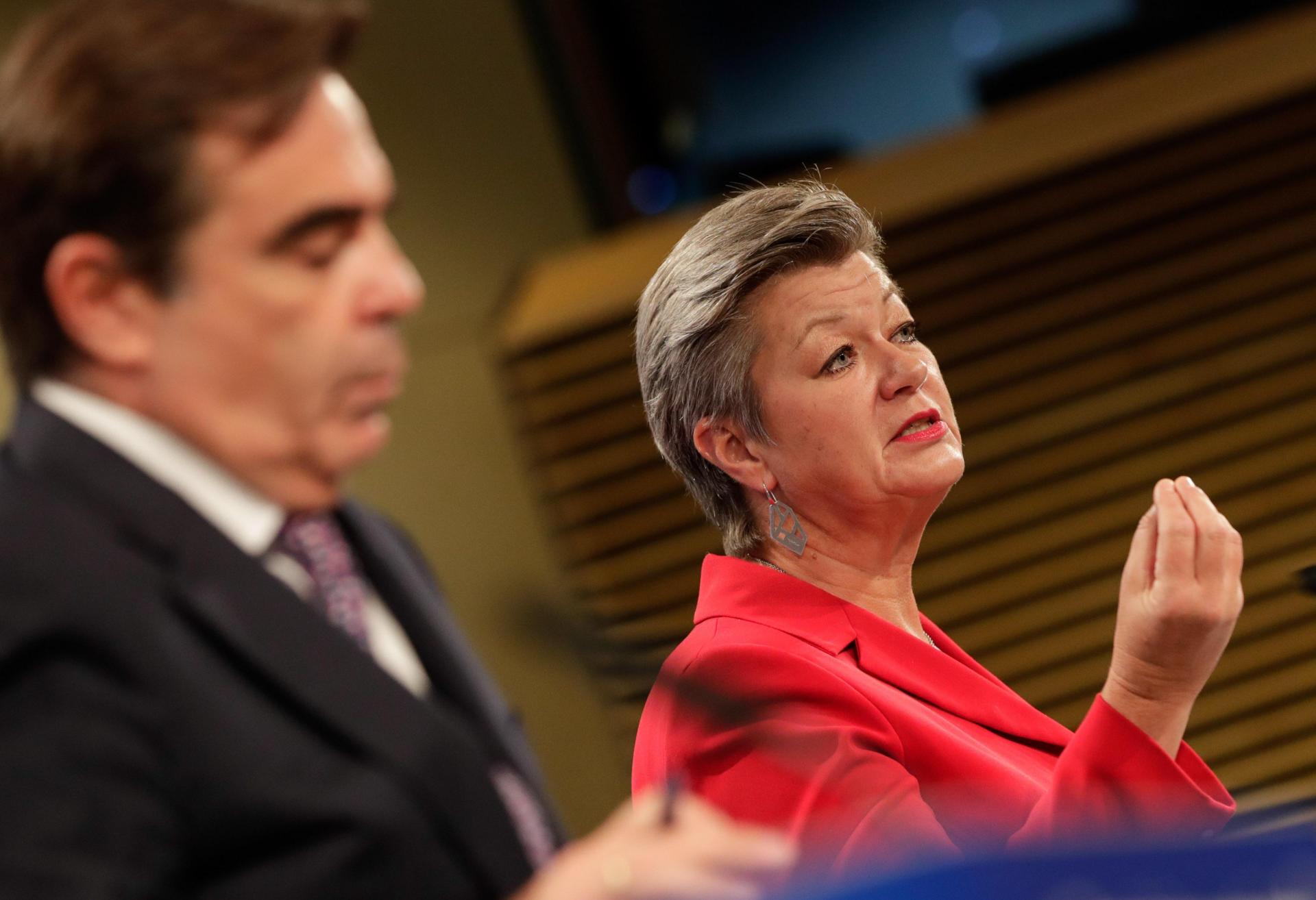 European Commissioner for Home Affairs Ylva Johansson (R) speaks as European Commissioner for Promoting our European Way of Life Margaritas Schinas (L) listens during a press conference on a New Pact for Migration and Asylum at the European Commission in Brussels on September 23, 2020. Photo: AFP