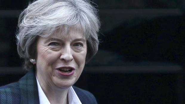 British Prime Minister Theresa May leaves 10 Downing Street earlier today. Photo: Reuters/Neil Hall