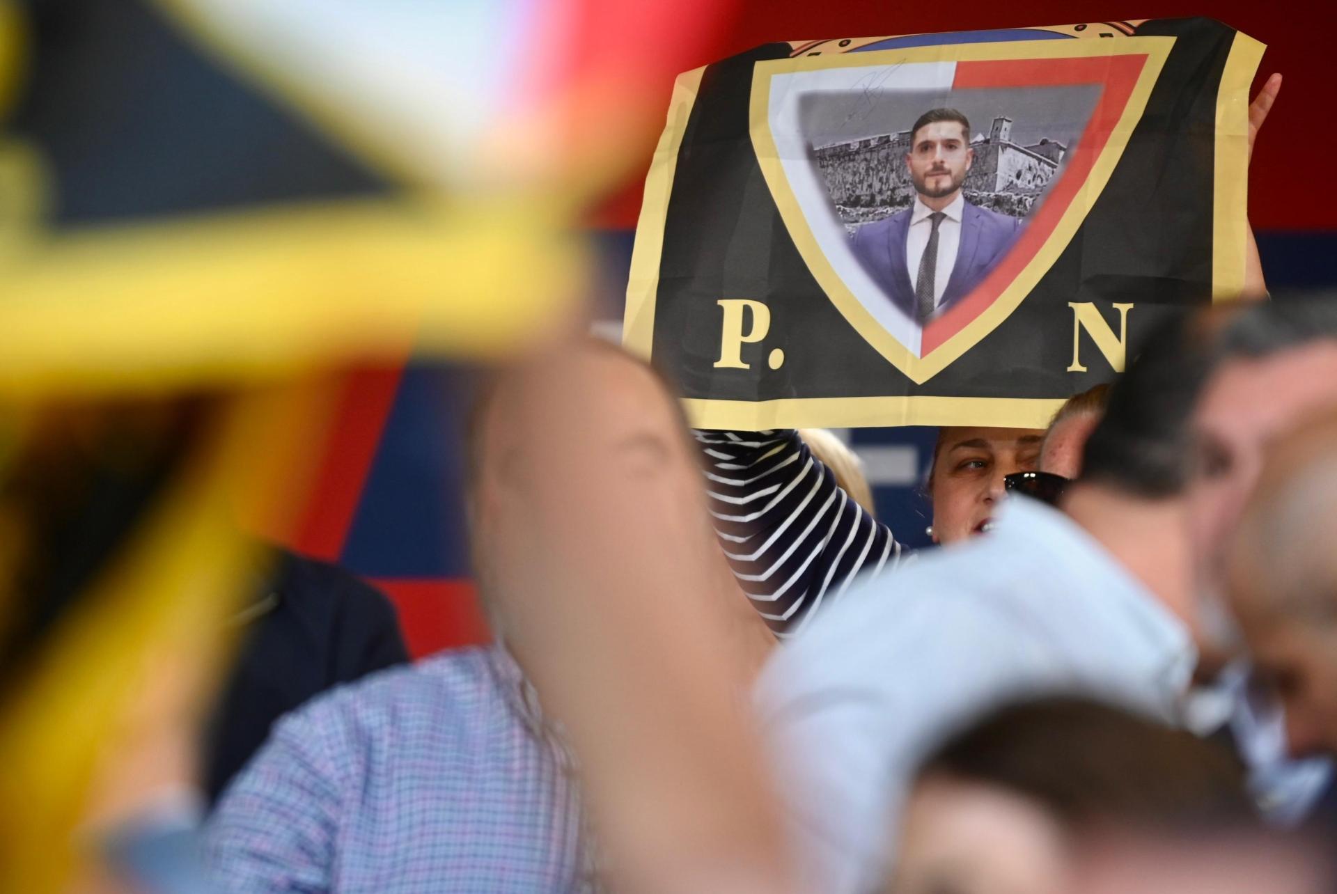 A PN flag featuring the PN's leader. Photo: Jonathan Borg