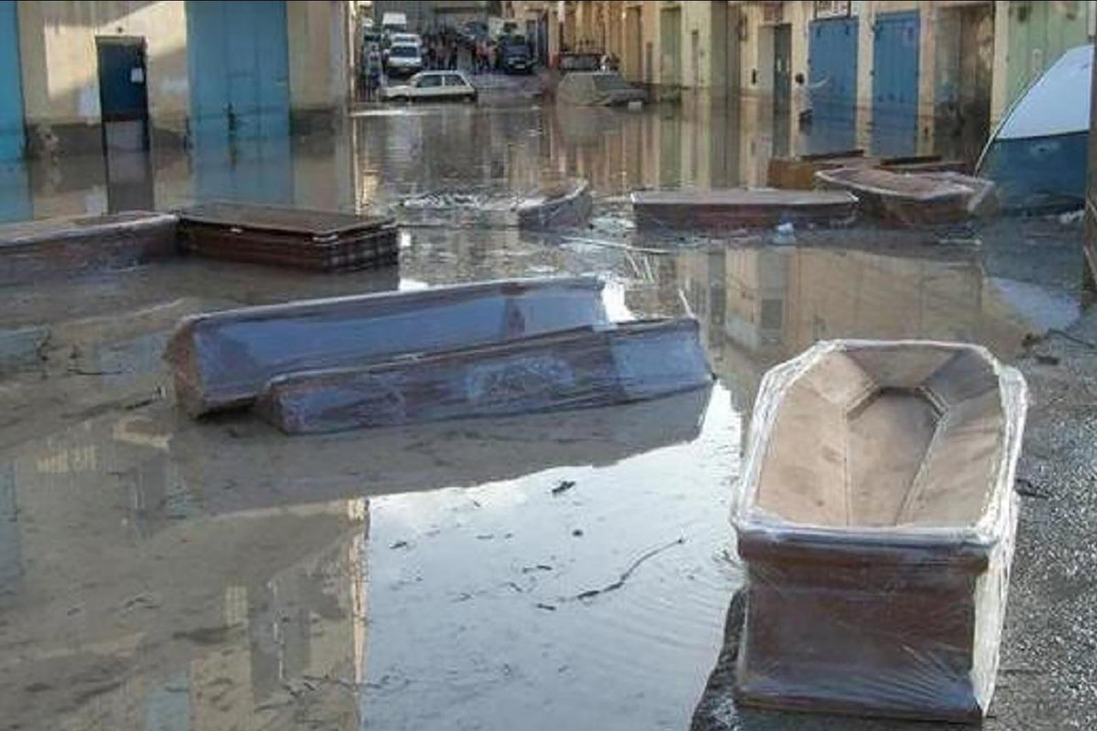 Coffins floating in Qormi after the 2010 storm. Photo: Richard Hili