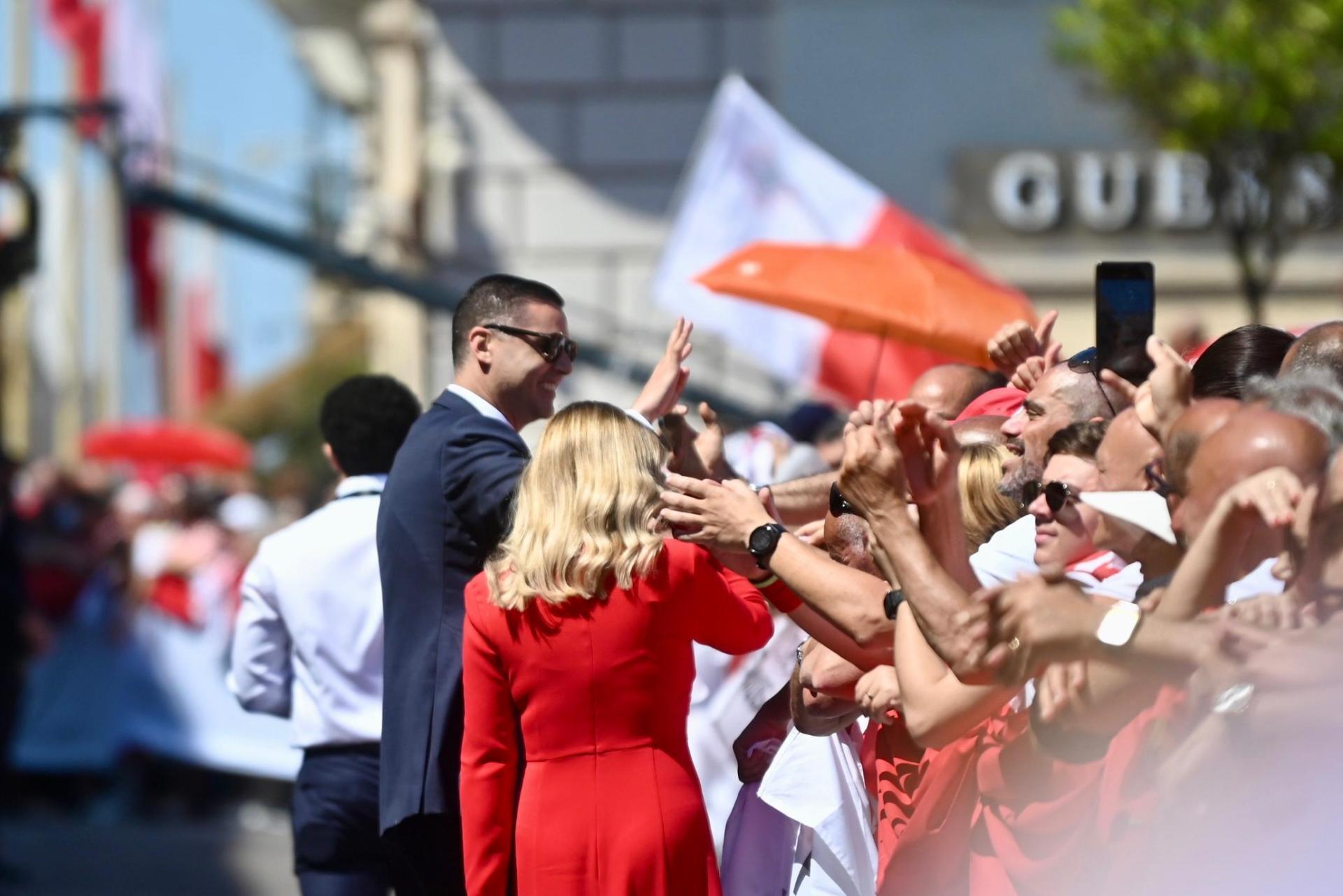Ian Borg and his wife Rachelle Dingli greet the crowds. Photo: Jonathan Borg