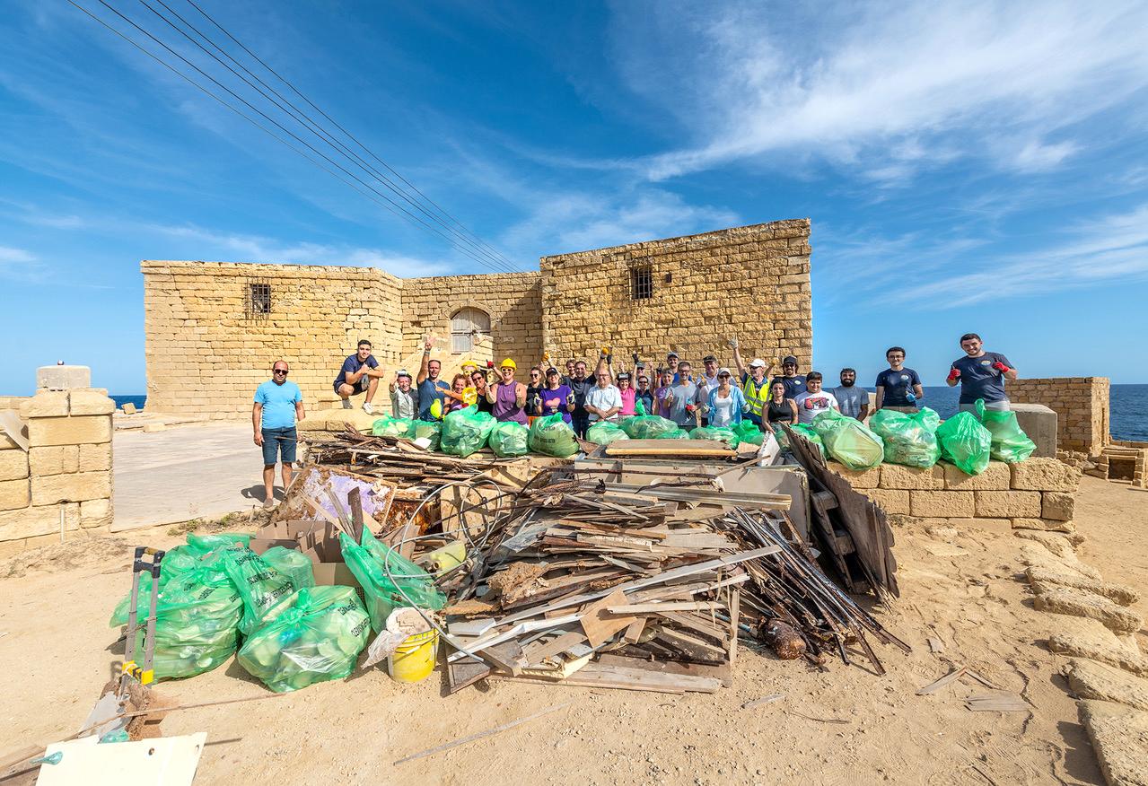 Participants in a clean-up of Qbajjar Battery held on October 22, 2023.
