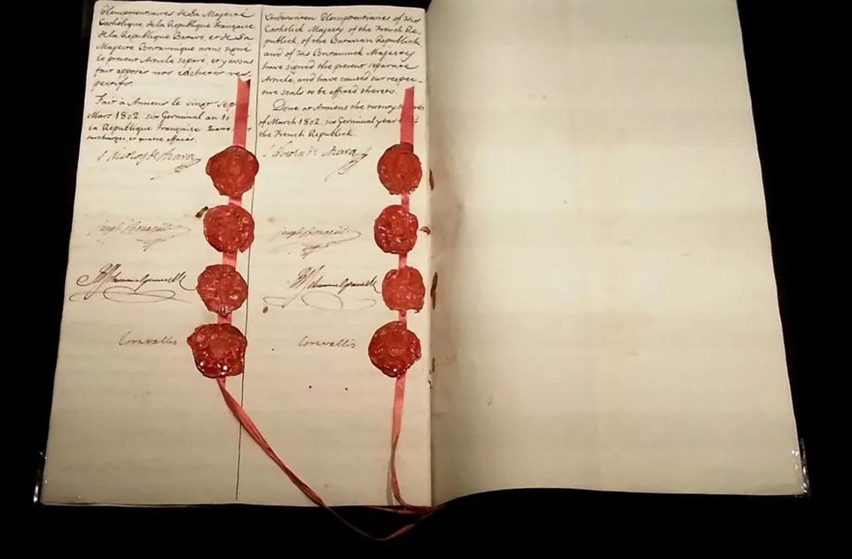 The page of the Treaty of Amiens containing the eight seals and signatures of the participants. Photo: Wikipedia.com