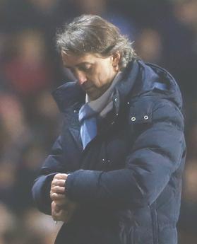 Roberto Mancini... time up.