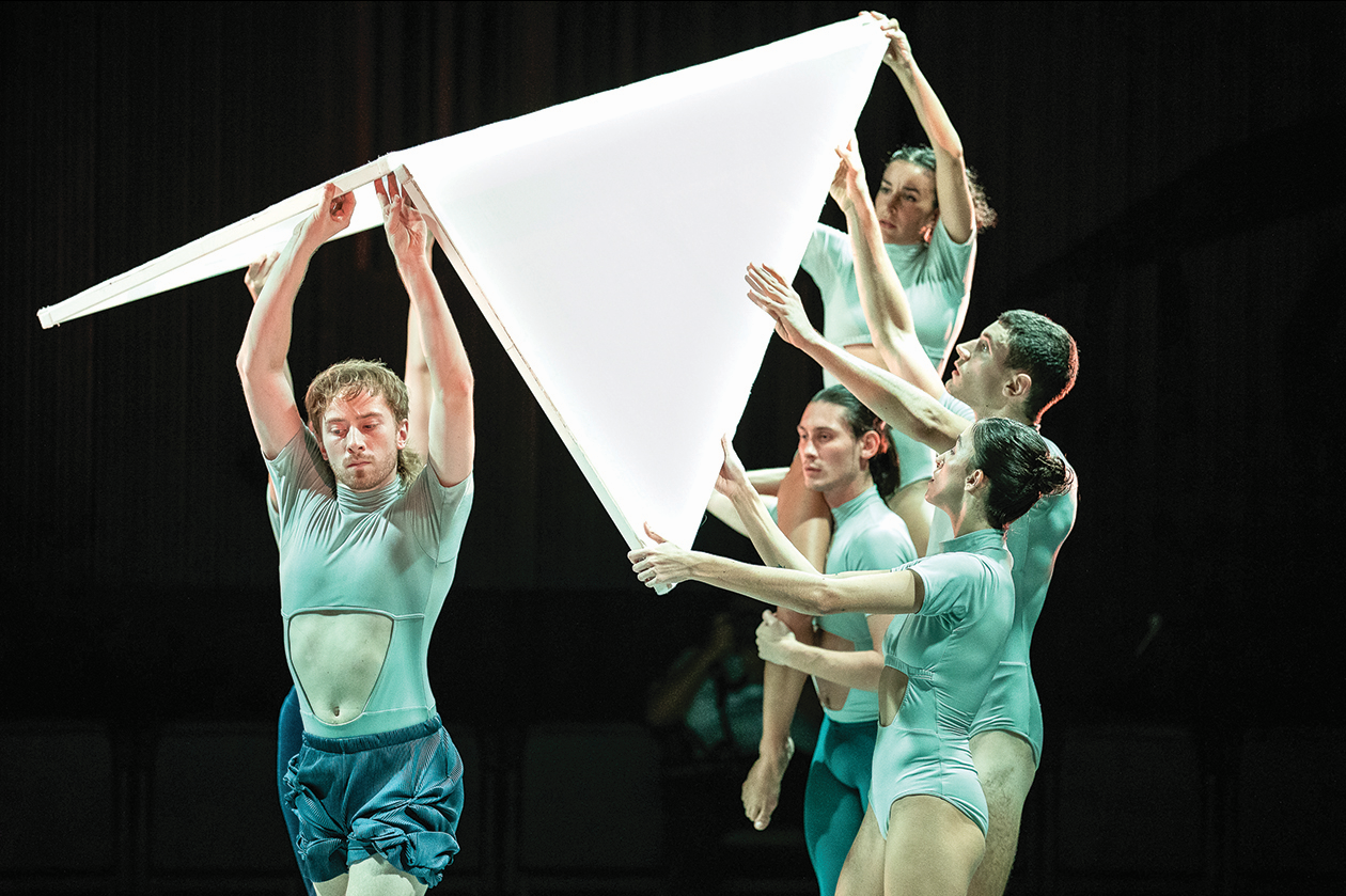 Screens were used by the dancers to make towering structures onstage. Photo: Camille Fenech