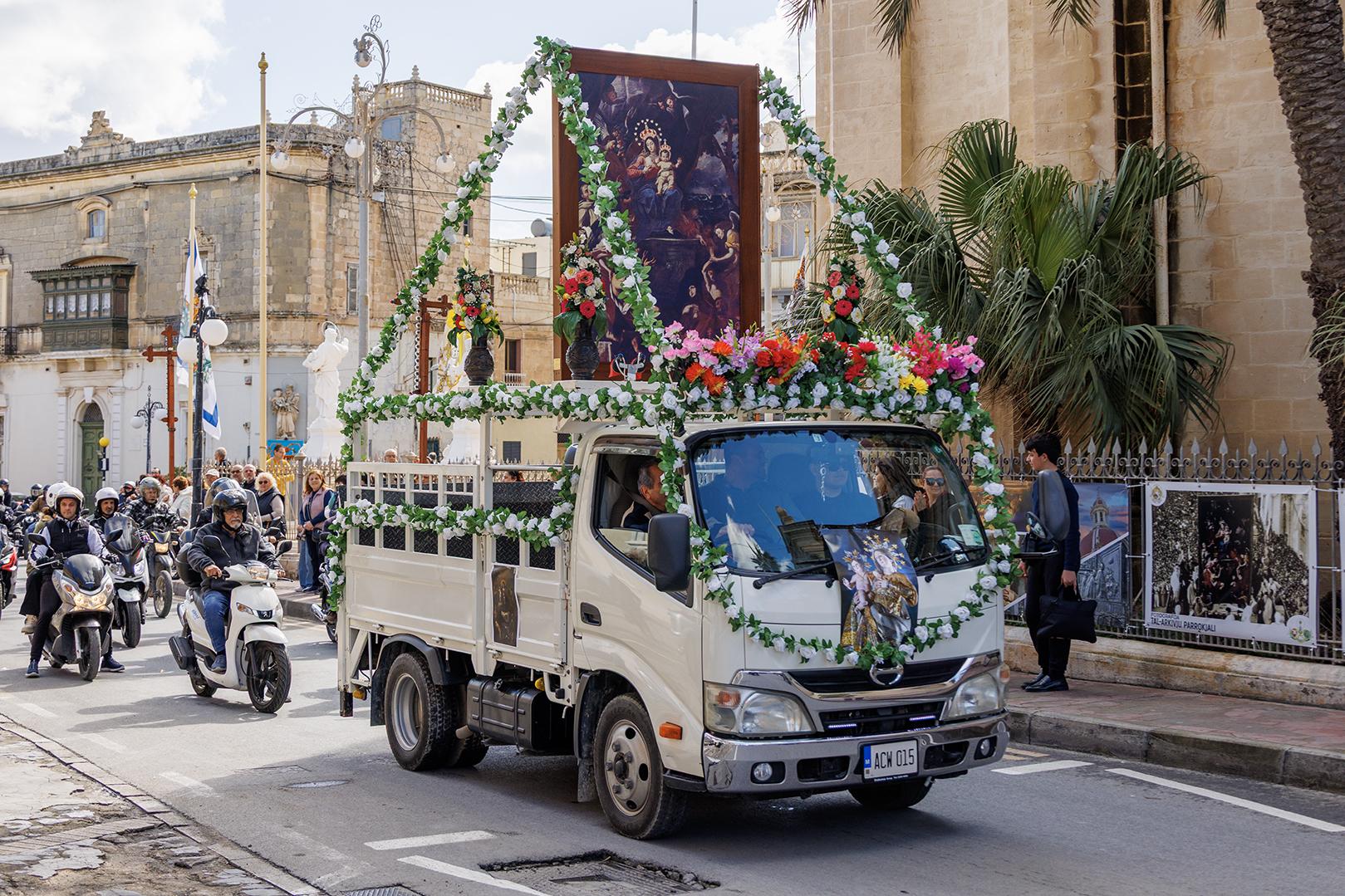 Madonna tal-Grazzja painting carried ahead of motorcycle pilgrimage in Żabbar. Photo: Mario L Borg CC BY-SA licence via Wikimedia Commons
