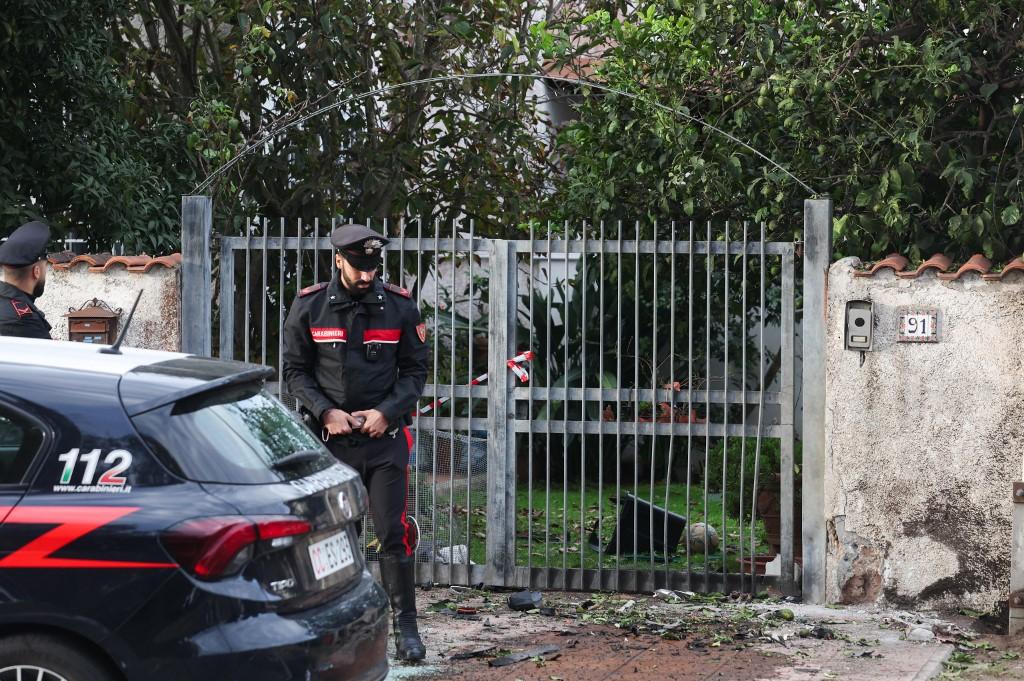 Italian Carabinieri stand guard in front of the residence of Italian journalist of TV investigative television news show 'Report', Sigfrido Ranucci, after a bomb destroyed vehicles parked in front of his house. Photo: AFP