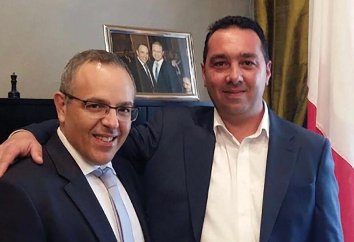 Keith Schembri and Melvin Theuma at Schembri's Castille office.