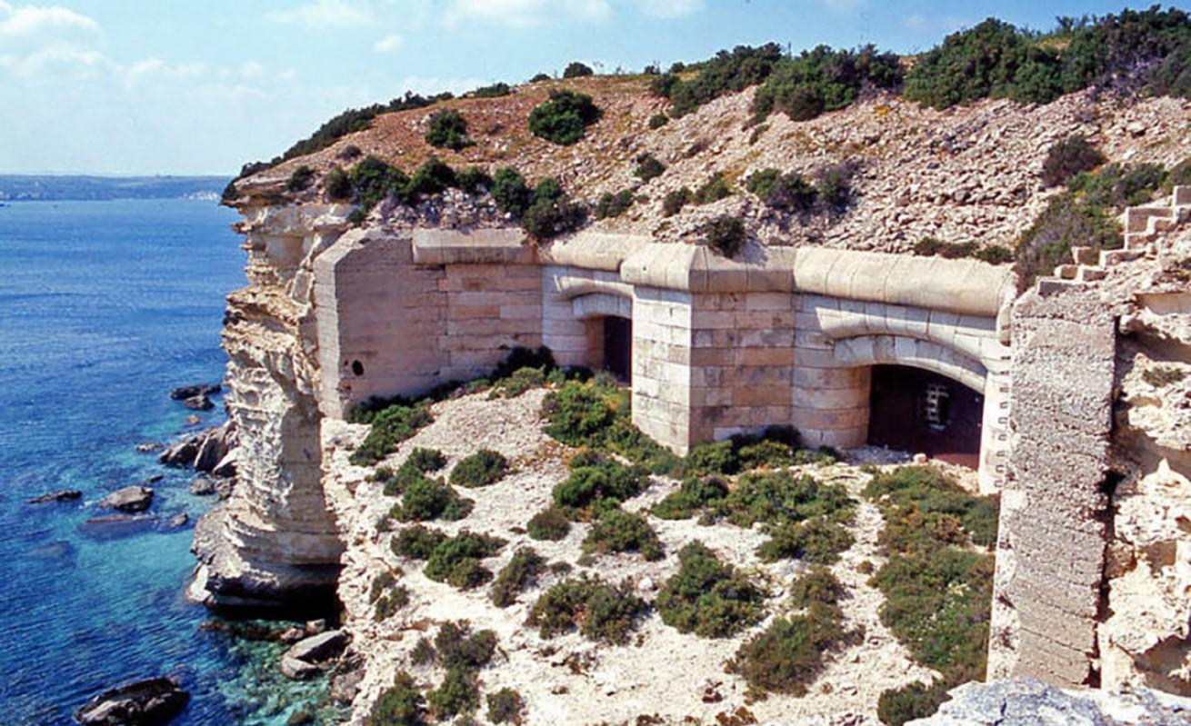 Fort Delimara: external view of two of the six casemates in the cliff-face. Photo: Heritage Malta