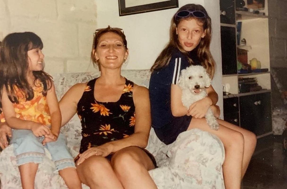 Two of the siblings as young children with their mother Mildred.