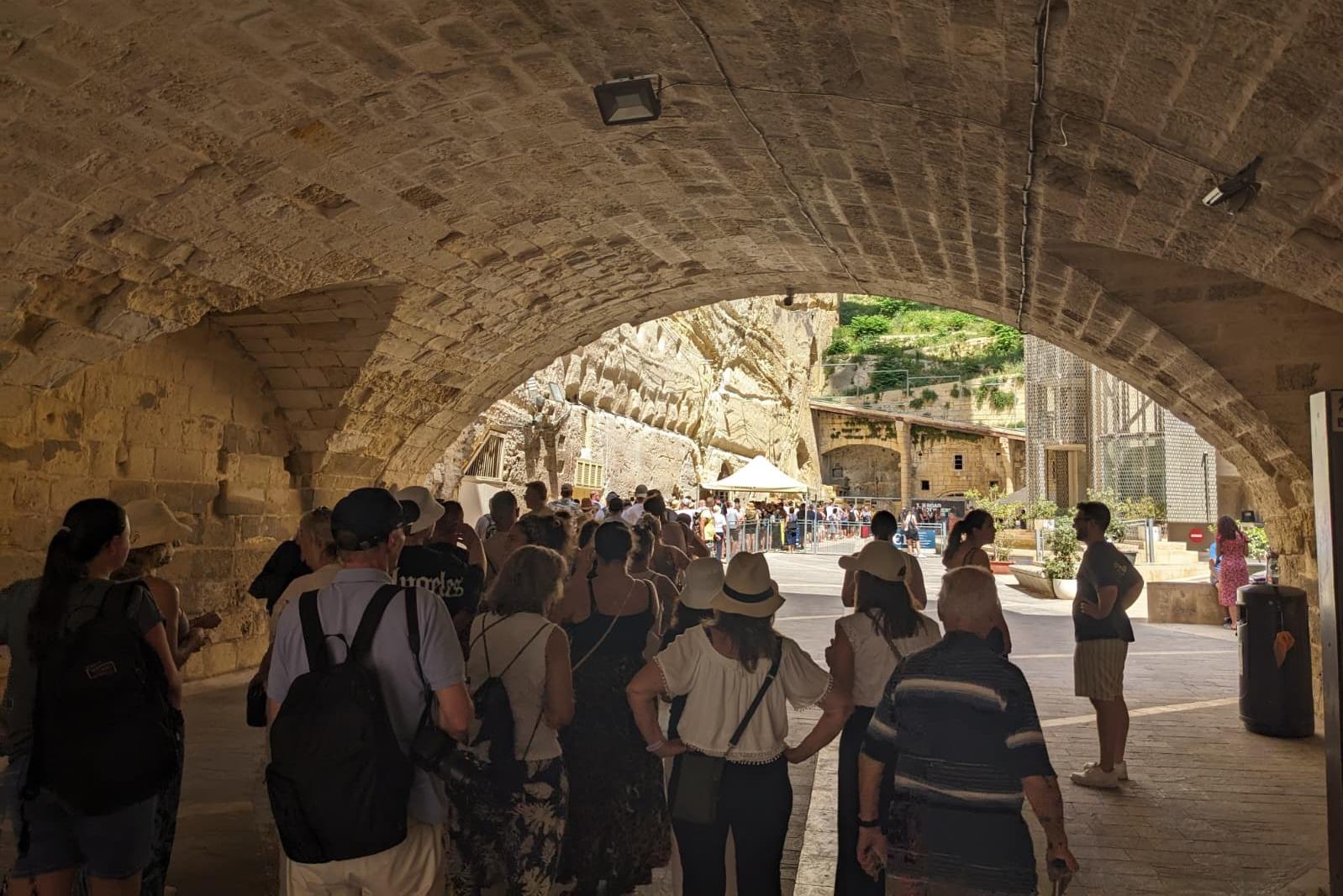 The issue is not a new one; this photo taken last year shows a long queue of cruise ship passengers during the morning commute.