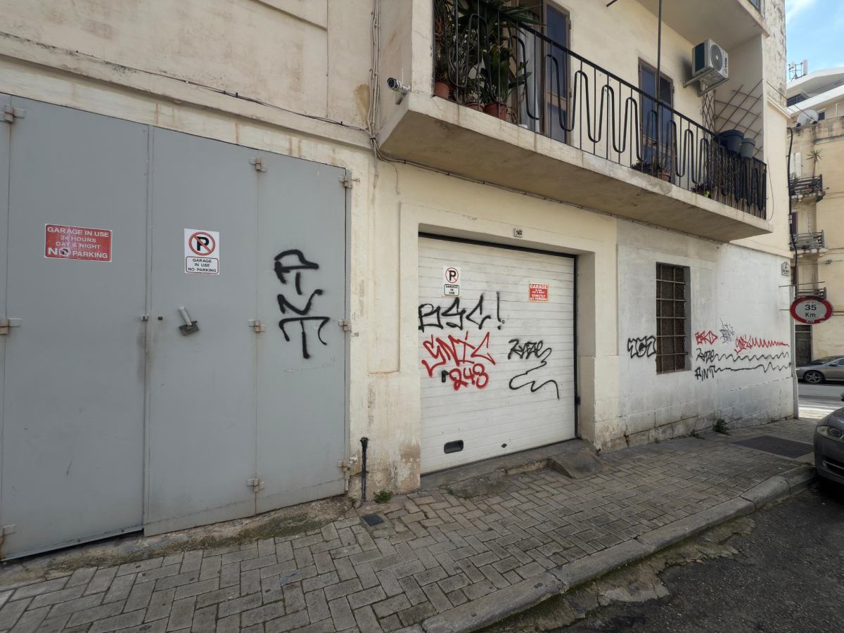 The perpetrator did not discriminate between garage doors, homes or shop fronts. Photo: Jonathan Borg