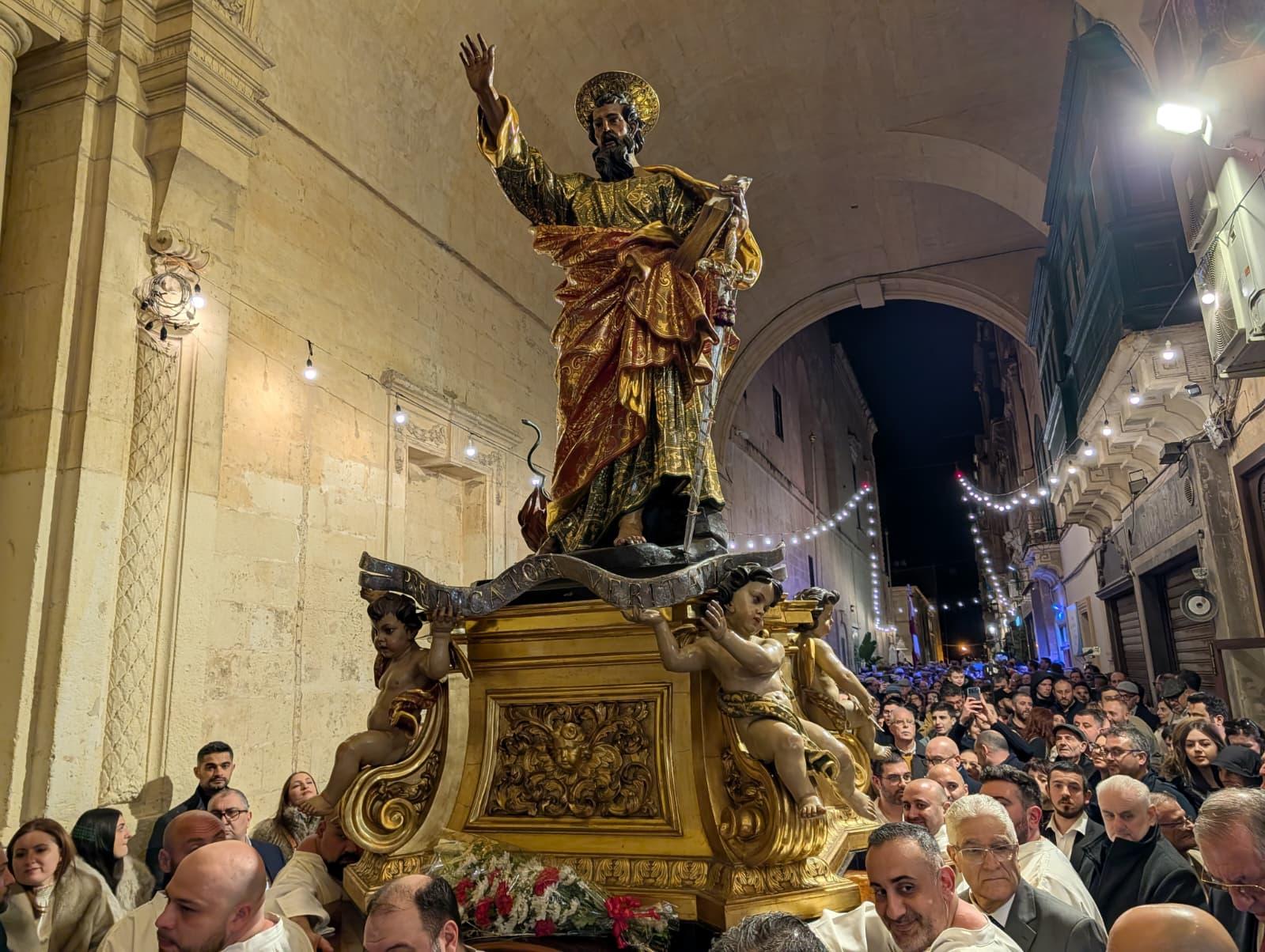 The procession with the statue of St Paul finally got underway an hour later than planned due to rain. Photo: Chris Sant Fournier