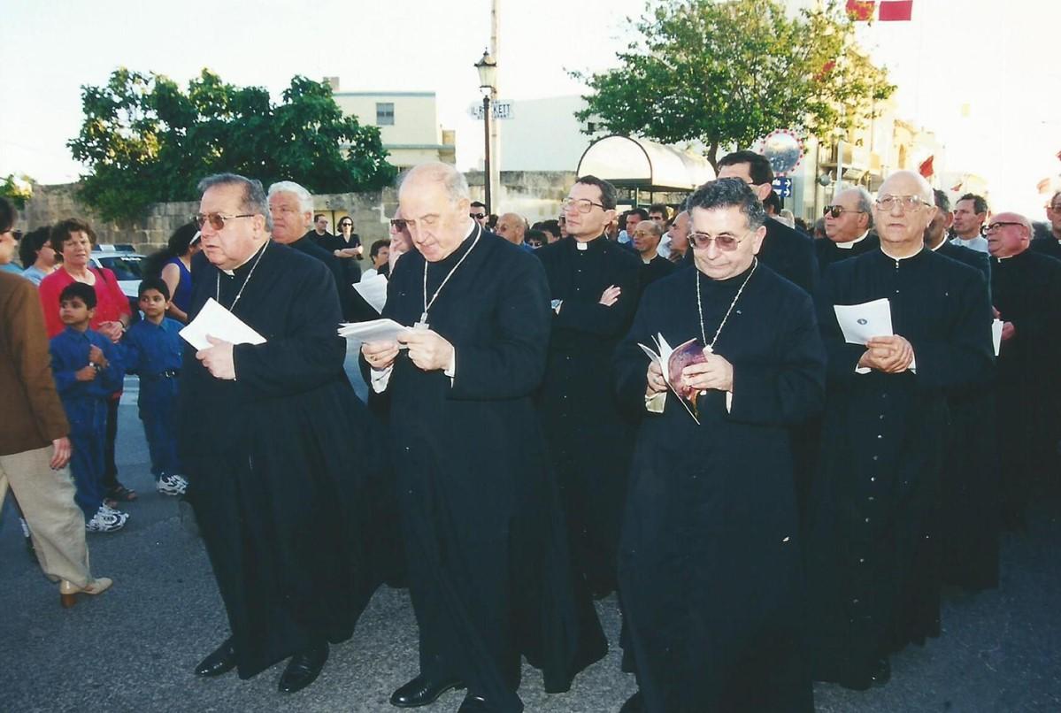 From left: Bishop Nicholas J. Cauchi, Archbishop Joseph Mercieca and Bishop Annetto Depasquale, together with a number of priests, leading the via crucis.