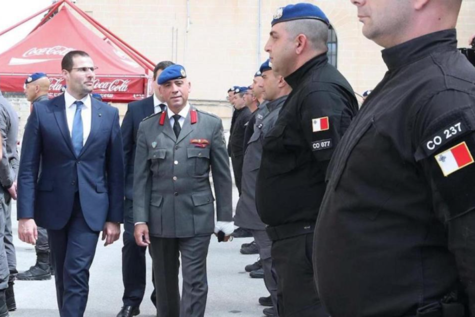 Former prisons director Alex Dalli (centre) with prime minister Robert Abela. File photo.