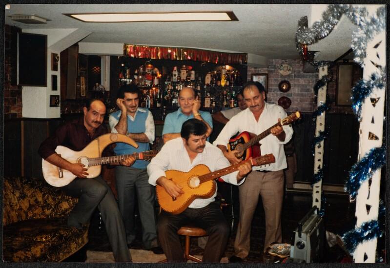 Il- Budaj performing with friends at a bar. Photo: The Frans Baldacchino 'Il-Budaj' Collection, courtesy of Magna Żmien.