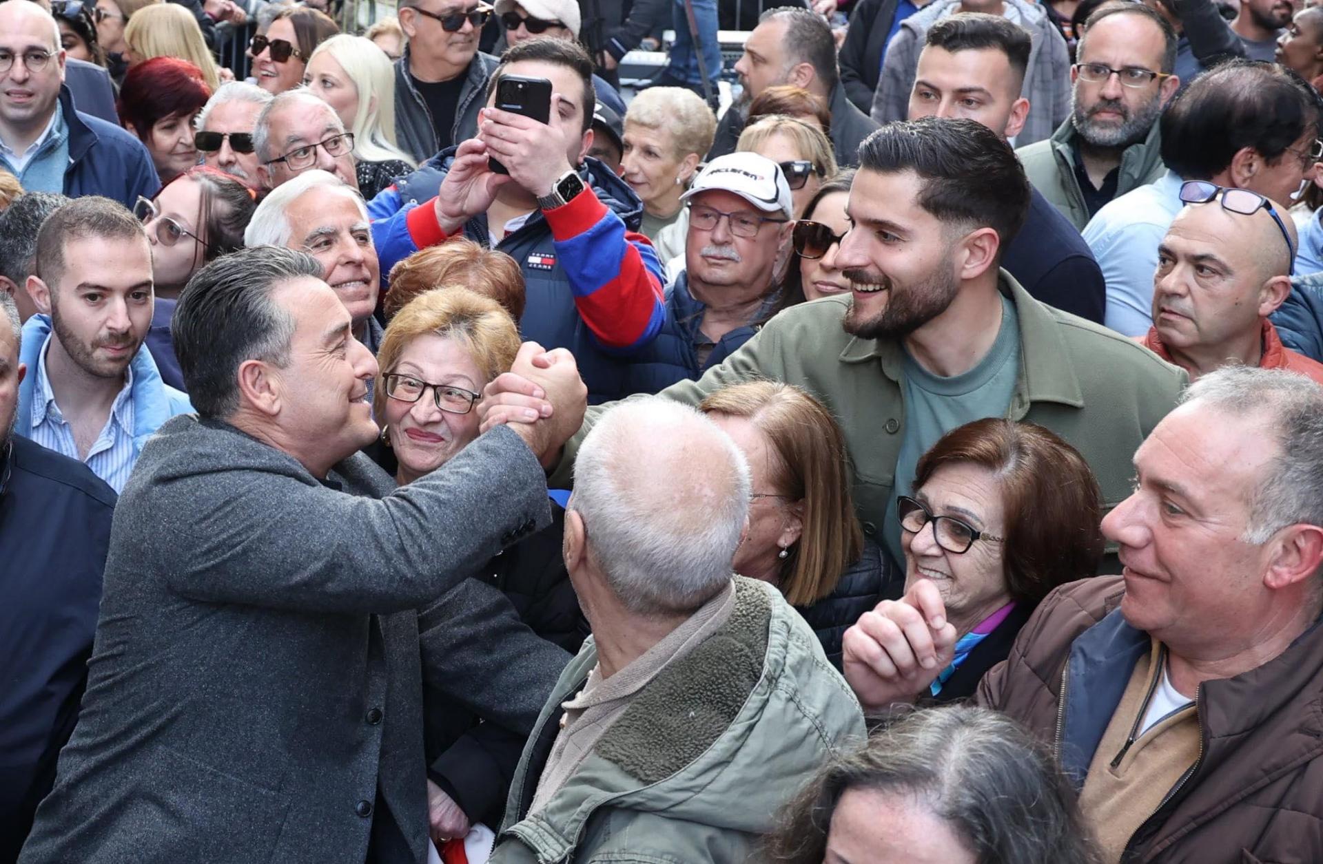 Alex Borg shaking hands with outgoing party leader Bernard Grech.