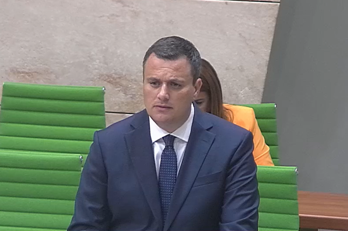 Home Affairs Minister Byron Camilleri speaking in parliament on Tuesday.