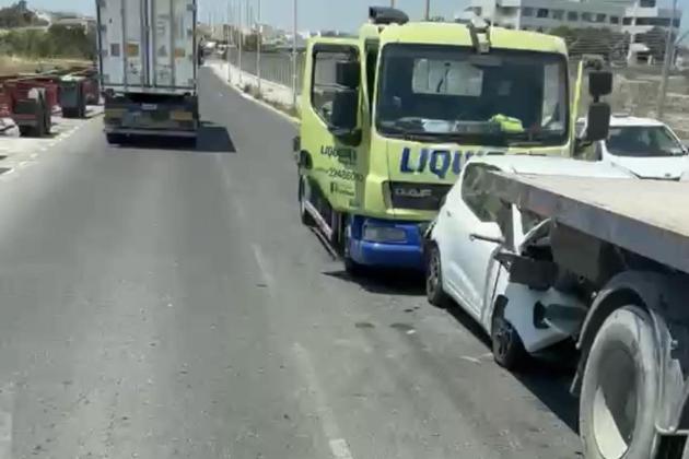 Driver hospitalised after car crushed between two trucks in  Birżebbuġa