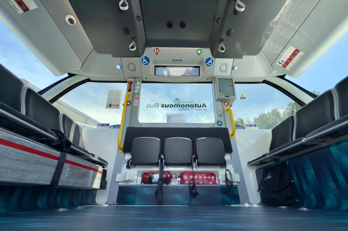 The interior features a departure from the normal bus layout of rows of seating. Photo: MPT.
