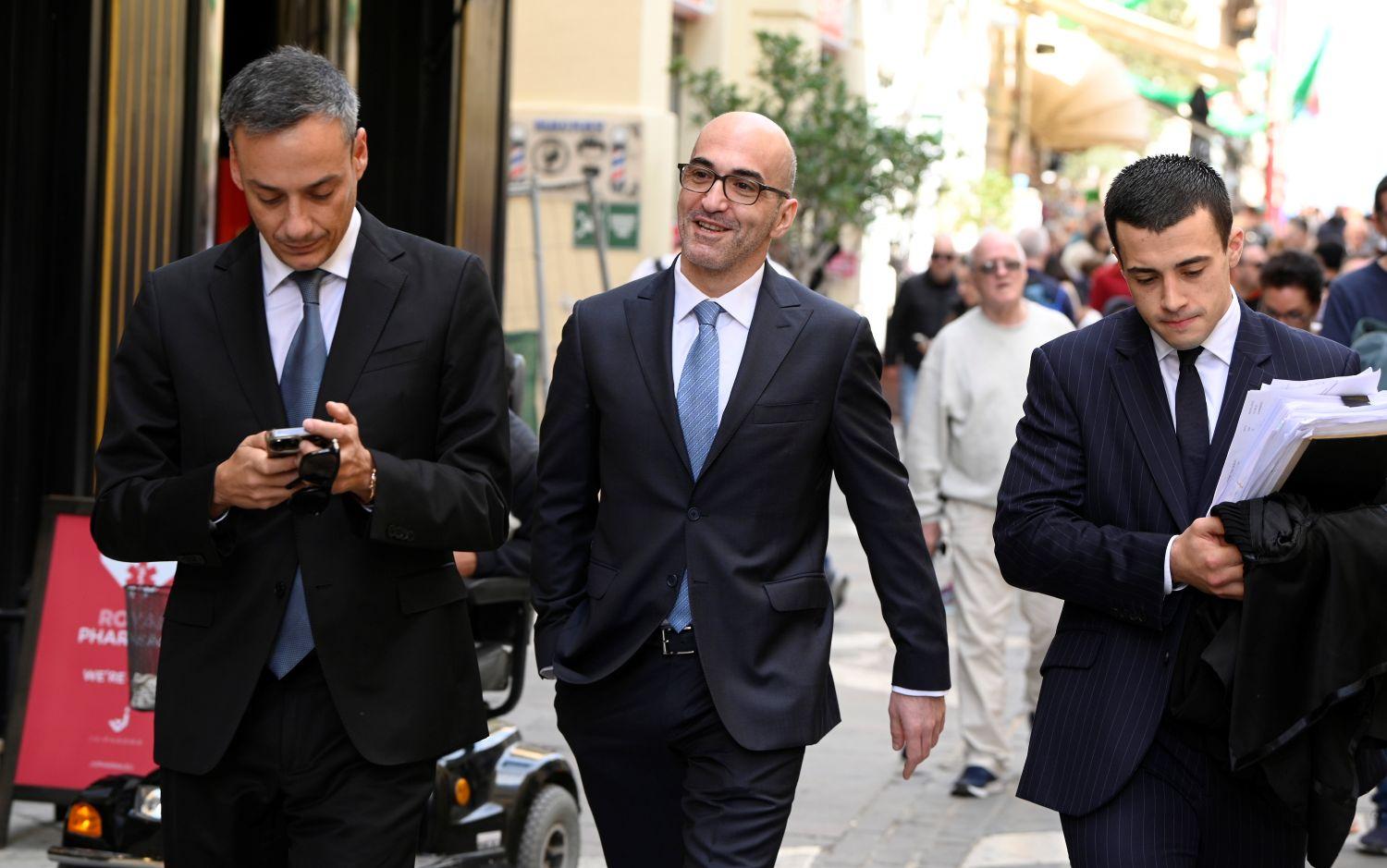 Yorgen Fenech (centre) outside court with two of his lawyers. Photo: Matthew Mirabelli