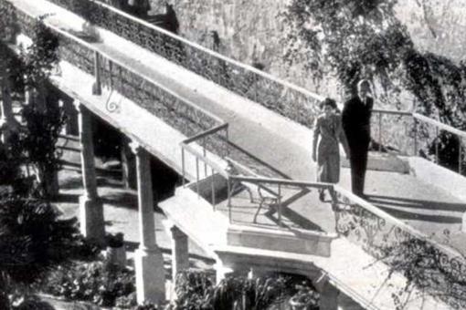 Princess Elizabeth and her husband on the walkway above the garden at Villa Guardamangia.