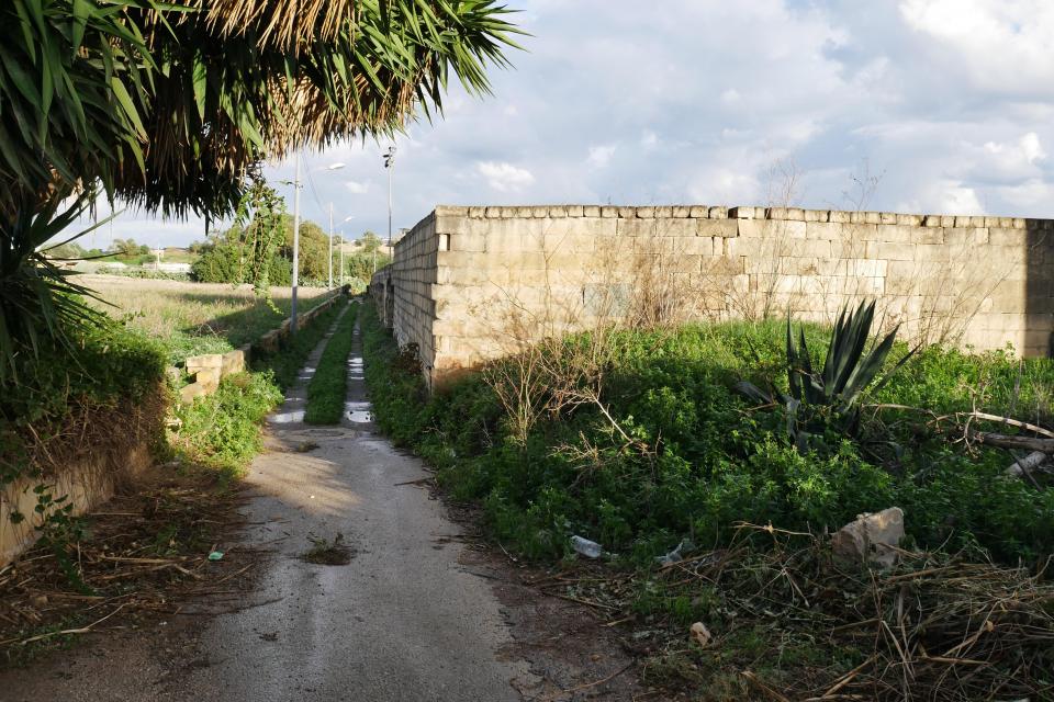 The triangular plot of land in dispute cuts across other areas owned by the plaintiffs, reducing its value. Photo: Julian Delia