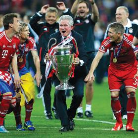 Jupp Heynckes (centre) has led Bayern Munich to a treble of German league, cup and Champions League.