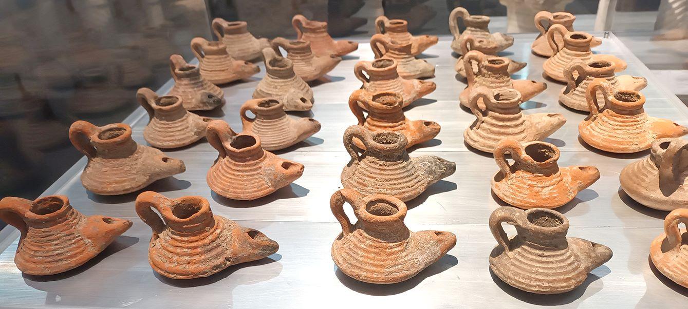 A set of 30 Byzantine lamps found in Gaza on show at the Paris exhibition. Photo: Charles Xuereb