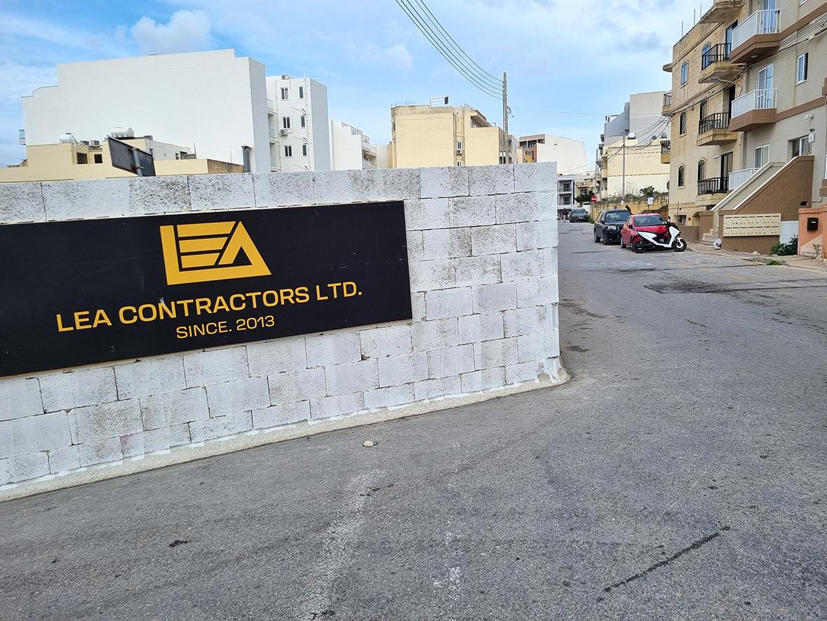 This boundary wall poses a danger to motorists and pedestrians.