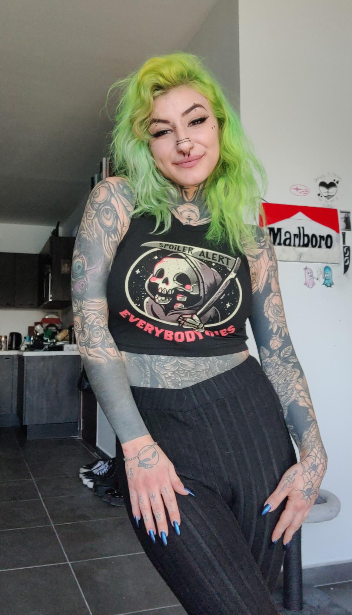 Julia Calleja says tattooing her stomach was less painful than laser removal.