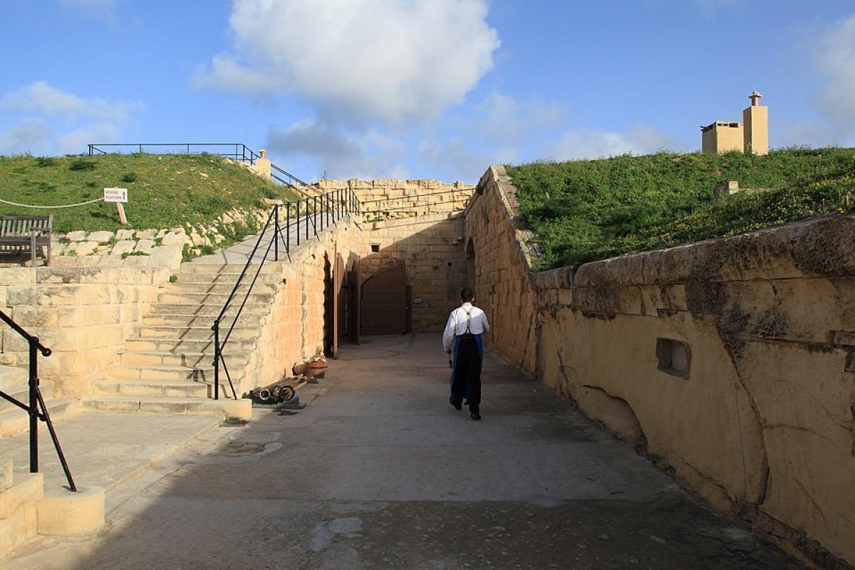 A view of the internal open area with entrances to the battery&rsquo;s underground stores, and barracks.