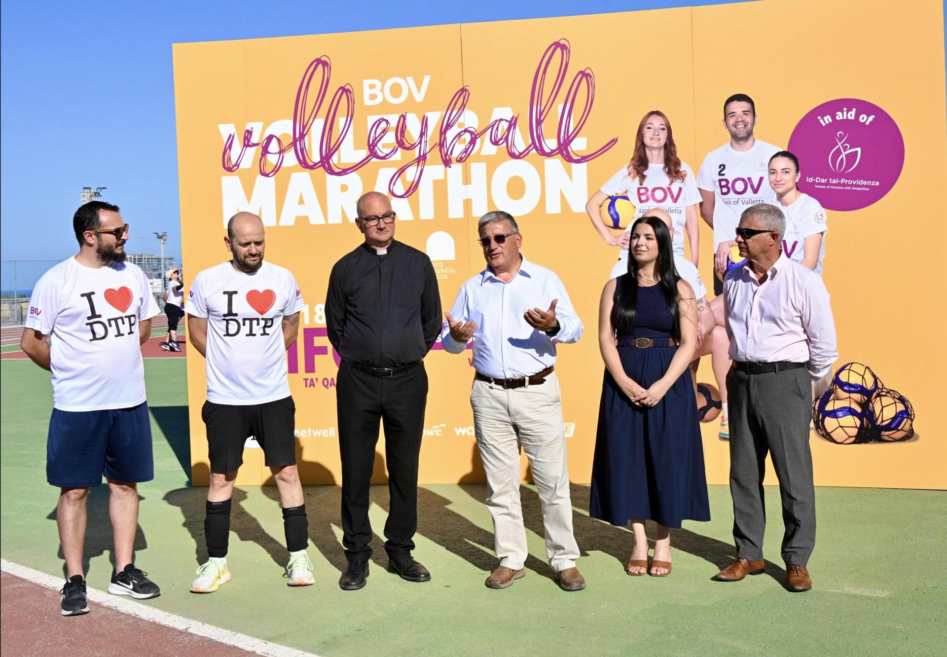 Mgr Martin Micallef, director of <em>Id-Dar tal-Providenza</em>&nbsp; (third from left) and Ernest Agius, COO, BOV (third from right) during the marathon's launch.