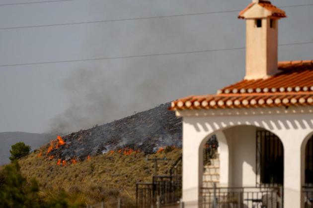 Firefighters gain upper hand on deadly Spain wildfire