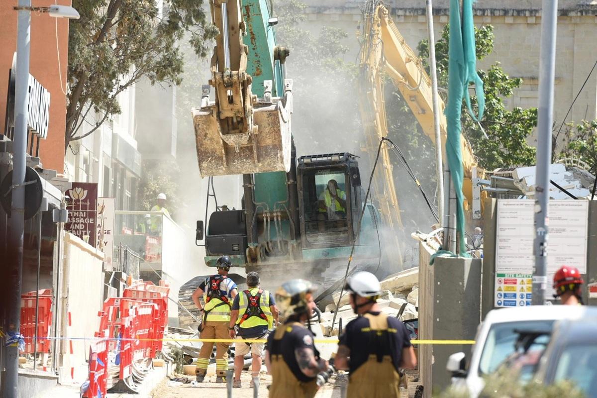 Demolition works underway to clear the remaining structure in Paceville. Photo: Chris Sant Fournier