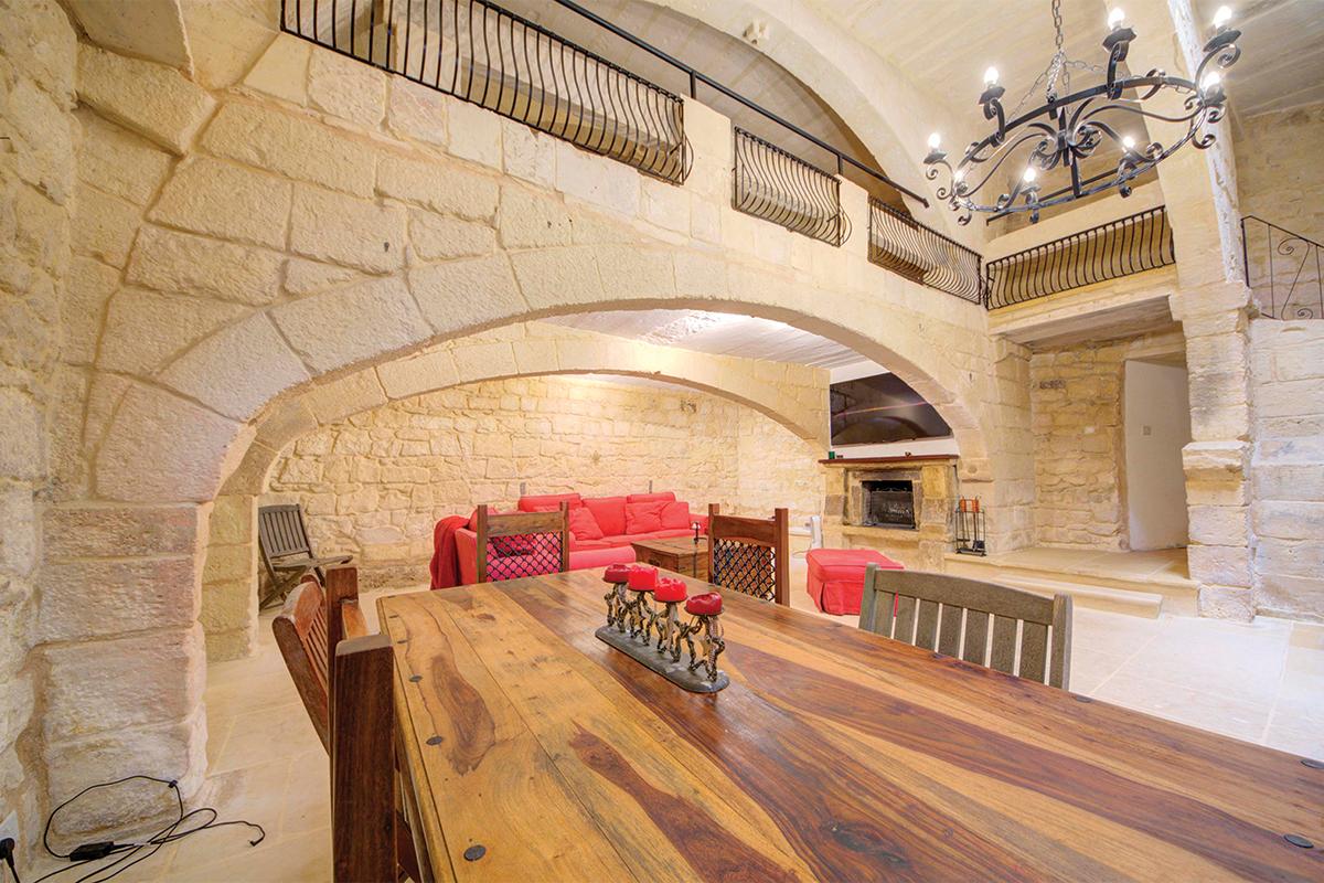 A mill room converted into a living space in a house of character.
