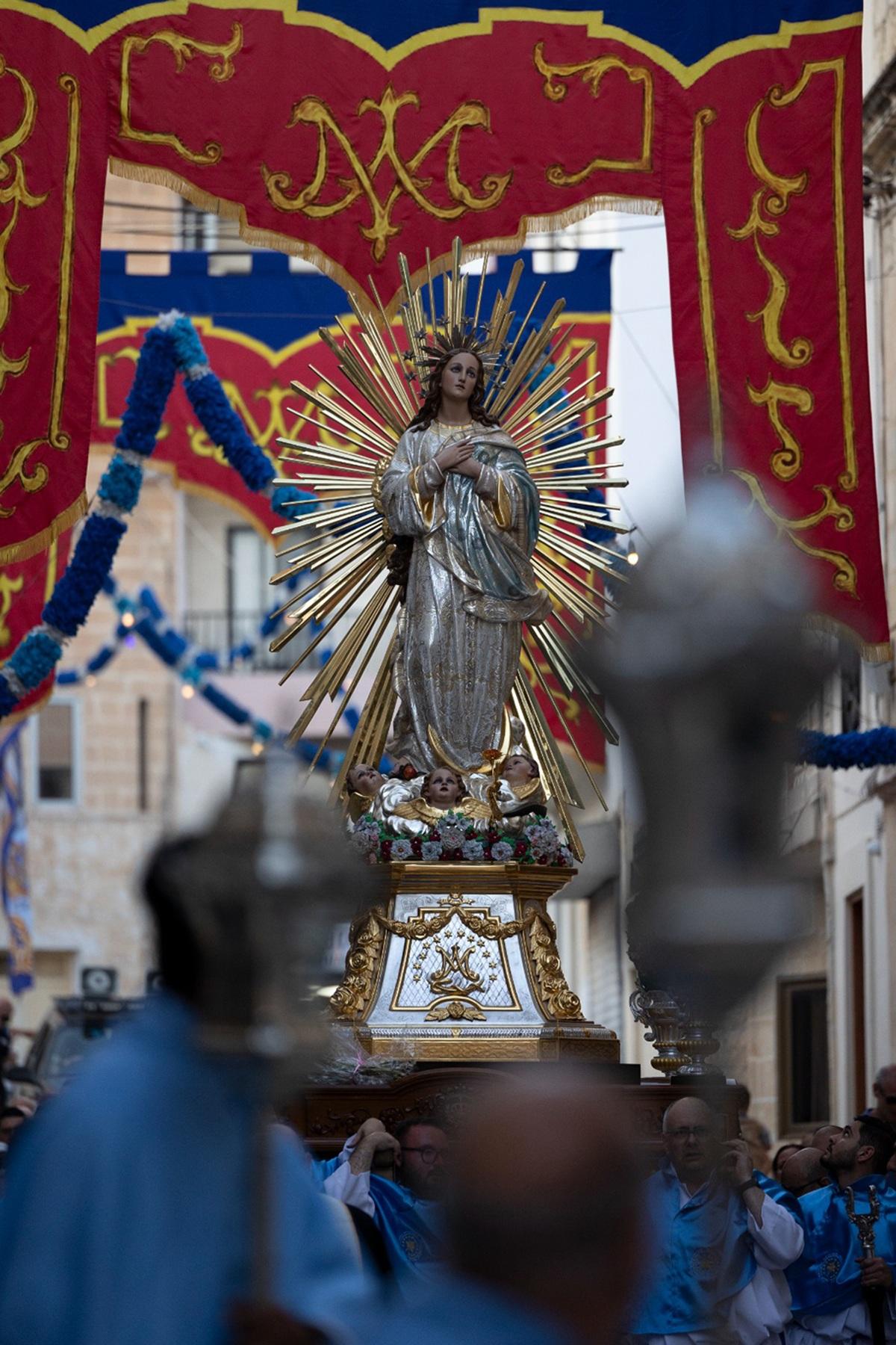 The statue during the festa procession.