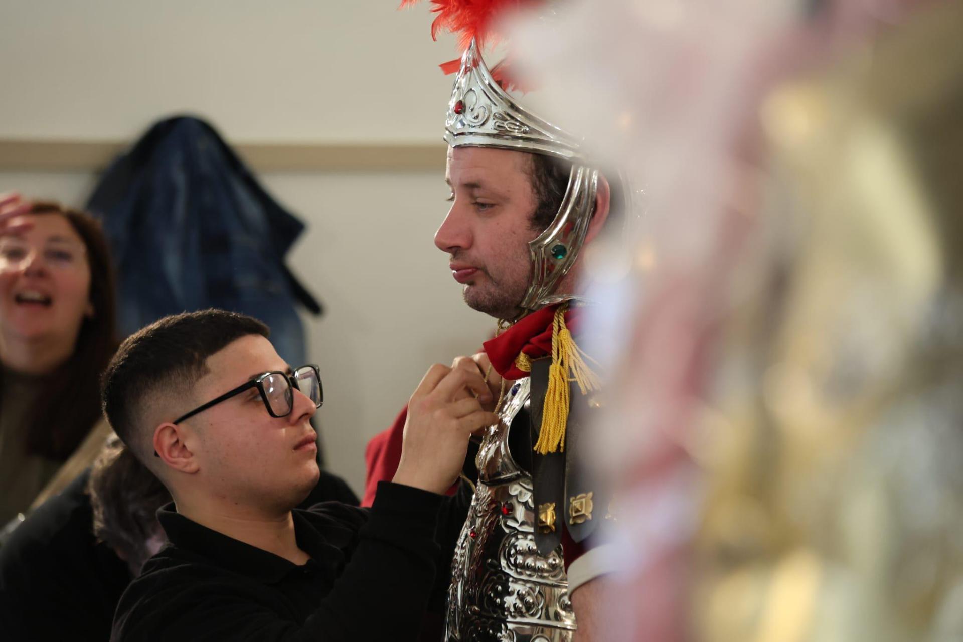 A participant of the procession in Cospicua getting ready for the parade. Photo: Kummissjoni Ġimgħa Kbira Bormla/Facebook