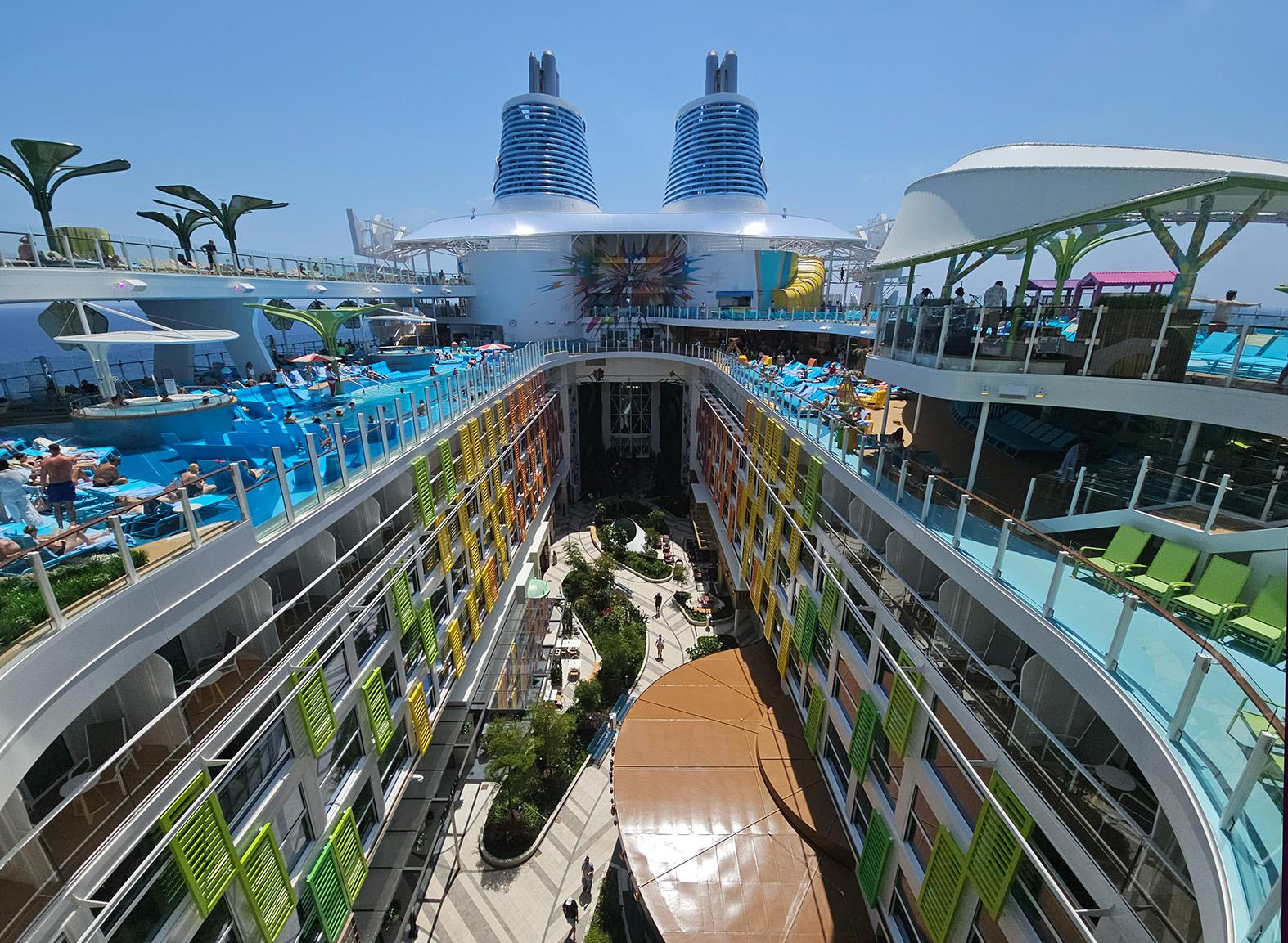 The upper decks host many pools and bars; in the ship&rsquo;s interior is a green walkway dubbed &lsquo;Central Park&rsquo;.