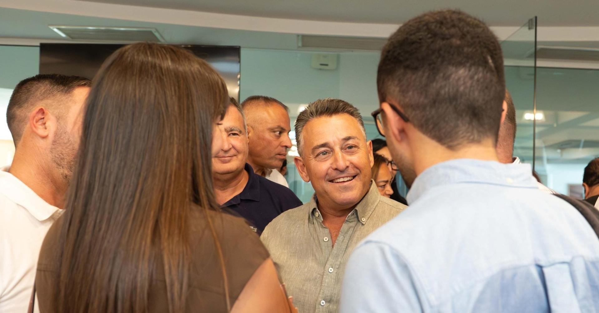 Outgoing PN leader Bernard Grech with well-wishers at the PN quarters.