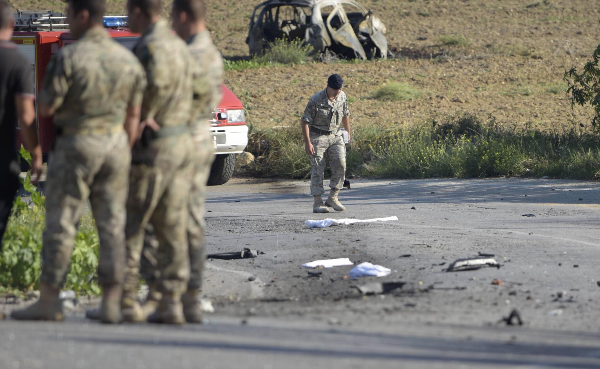 Debris lies on the ground at the site where Daphne Caruana Galizia's car was blown up in October 2017. Photo: Mark Zammit Cordina